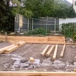 Pool after demolition while garden being framed up