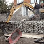 Gabion basket retaining wall construction